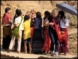 Kids besiege Tourists with beads