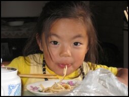 Samina eating Laghman